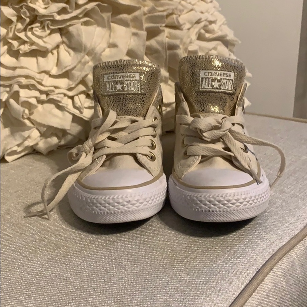 Gold Converse Chuck Taylor low tops